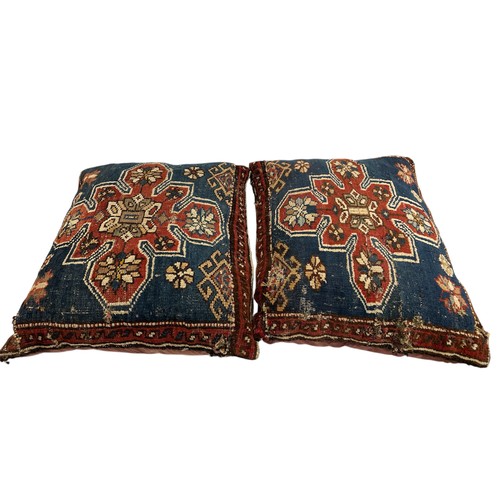 1640 - Collection of cushions, the covers being cut from an antique Persian rug, 60cm x 60cm (11)