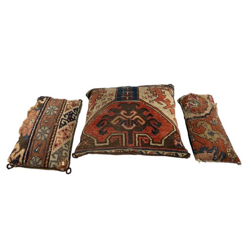 1640 - Collection of cushions, the covers being cut from an antique Persian rug, 60cm x 60cm (11)