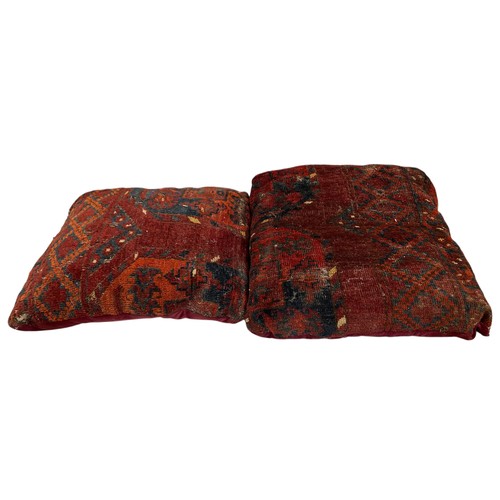 1640 - Collection of cushions, the covers being cut from an antique Persian rug, 60cm x 60cm (11)