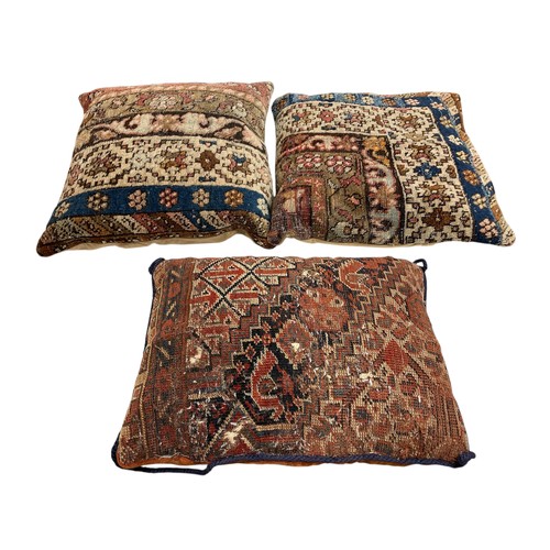 1639 - Collection of cushions, the covers being cut from an antique Persian rug, together with an impressiv... 