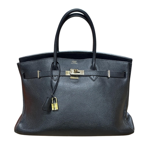 162 - Hermès Black Birkin 40 Togo leather handbag, having polished gold-tone hardware, dual rolled leather... 