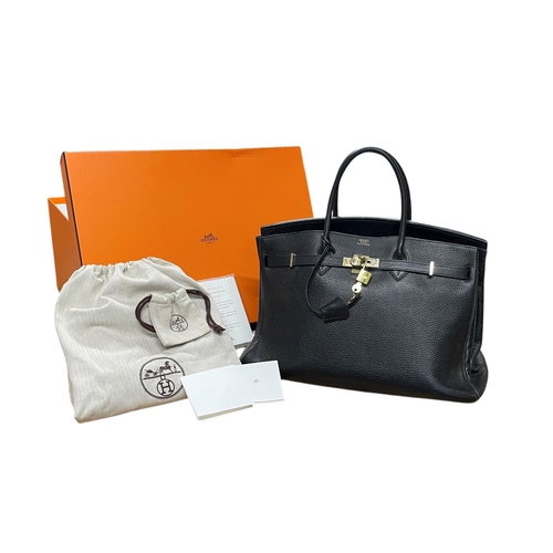 162 - Hermès Black Birkin 40 Togo leather handbag, having polished gold-tone hardware, dual rolled leather... 