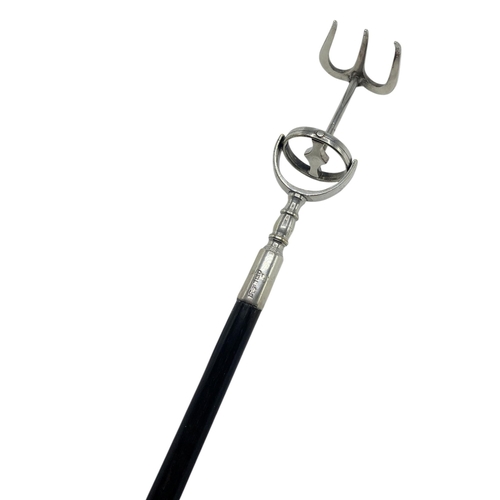 118 - George V Asprey toasting fork, with ebonised shaft, the fork secured via a gimble mechanism, the sil... 