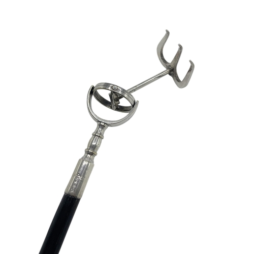 118 - George V Asprey toasting fork, with ebonised shaft, the fork secured via a gimble mechanism, the sil... 