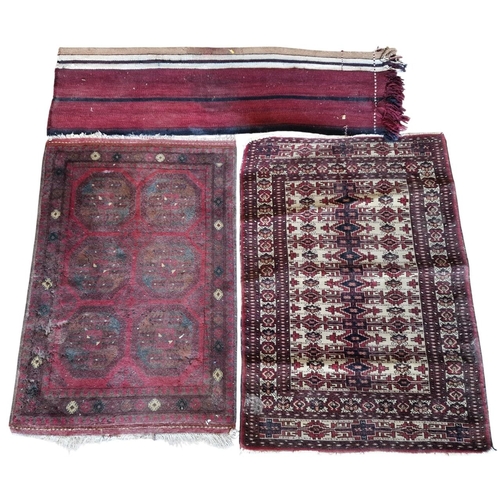 1699 - Three rugs of various designs, largest 156cm x 112cm (3)