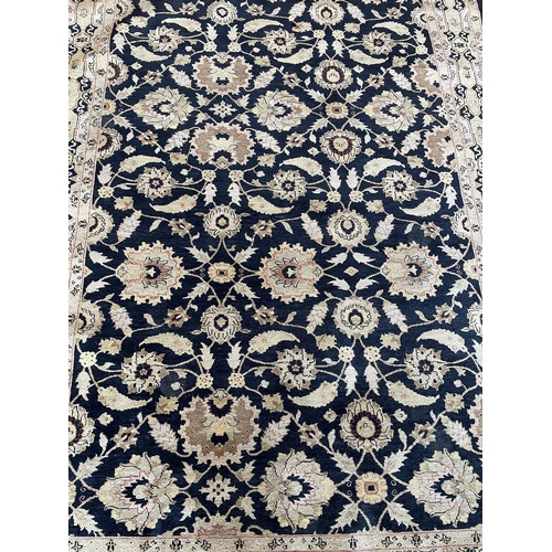 1678 - Samson machine woven wool and cotton Keshan rug, black ground, 185cm x 268cm