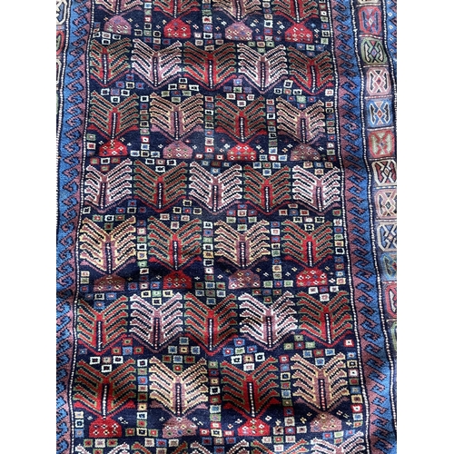 1679 - Good Baluchi rug with geometric decoration, 200cm x 105cm