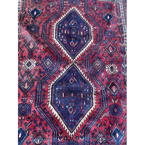 1683 - Large Hamadan type twin medallion rug, red ground, 240cm x 180cm