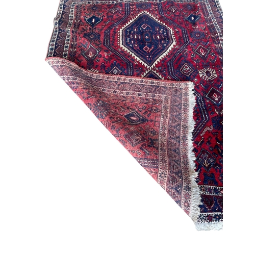 1683 - Large Hamadan type twin medallion rug, red ground, 240cm x 180cm