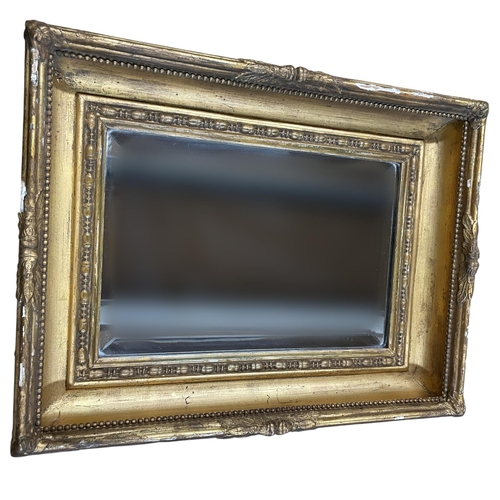 1138 - 19th century gold gilt wall mirror, having bevelled edge mirror with beaded border surround, 44cm X ... 