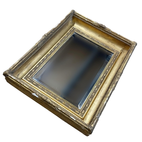 1138 - 19th century gold gilt wall mirror, having bevelled edge mirror with beaded border surround, 44cm X ... 