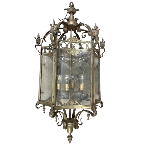 1062 - Exceptional quality brass framed glass hall lantern, six etched glass concave panels on a scrolled f... 