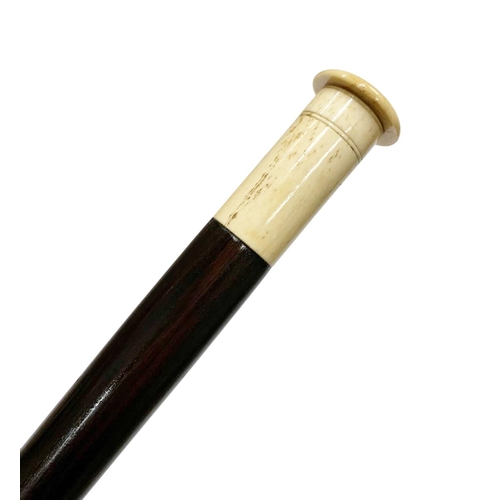 646 - Carved bone handled compartment cane, the cap of the handle unscrews to reveal space within, having ... 