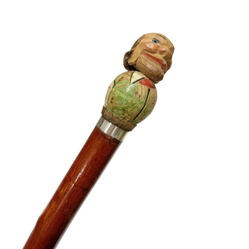 656 - Folk Art stained red hardwood automaton walking cane of balding gentleman, depressing the lever leng... 