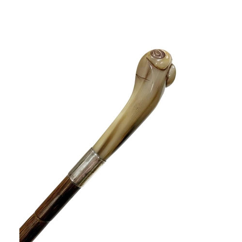 663 - Stepped partridge wood shaft walking cane with light cow horn handle carved as a frog head, with sil... 