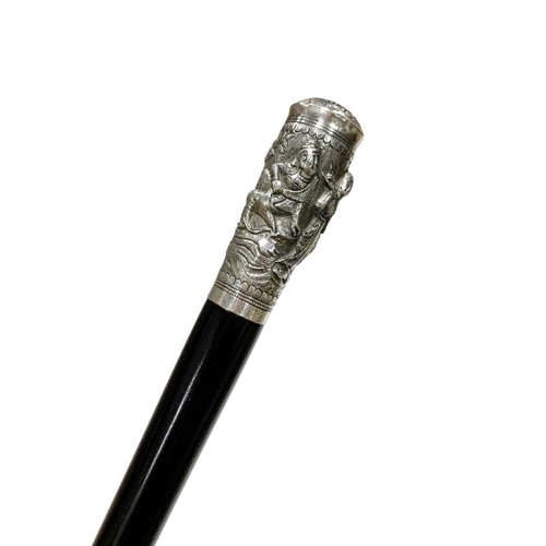 666 - Polished hardwood shaft walking cane with silver handle, having dancing Asian figures and central fl... 