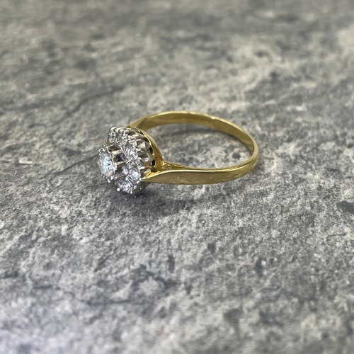 44 - Good 18ct and diamond halo ring, central stone .30ct, framed by eight smaller diamonds, size Q, 3.9g