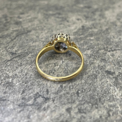 44 - Good 18ct and diamond halo ring, central stone .30ct, framed by eight smaller diamonds, size Q, 3.9g