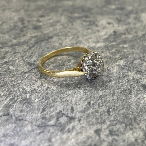 44 - Good 18ct and diamond halo ring, central stone .30ct, framed by eight smaller diamonds, size Q, 3.9g