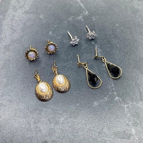 60 - Pair of 9ct gold and cabochon paste imitation opal stud earrings, with pair of platinum and cubic zi... 