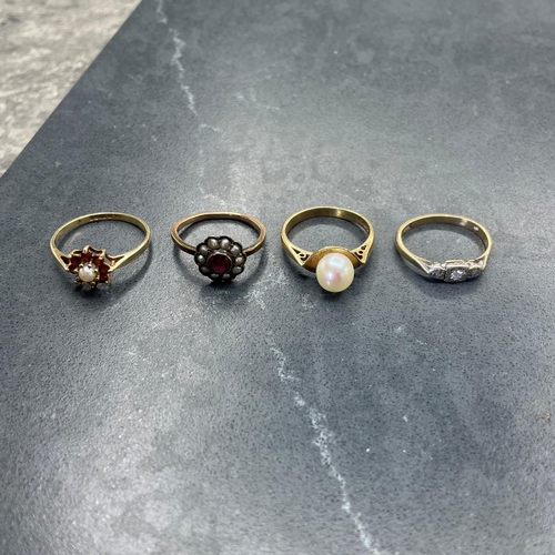 50 - Four 9ct rings to include two garnet and cultured pearl, large cultured pearl solitaire and a three ... 