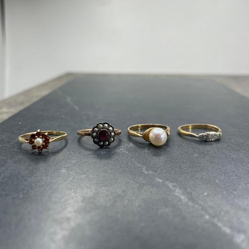 50 - Four 9ct rings to include two garnet and cultured pearl, large cultured pearl solitaire and a three ... 