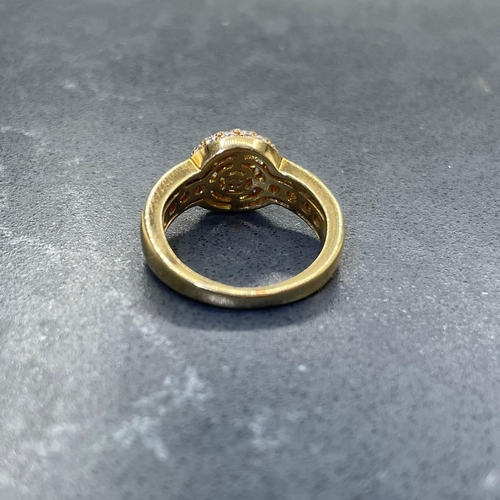 54 - Impressive '750' and diamond halo ring, central stone .5ct, framed by smaller diamonds with further ... 