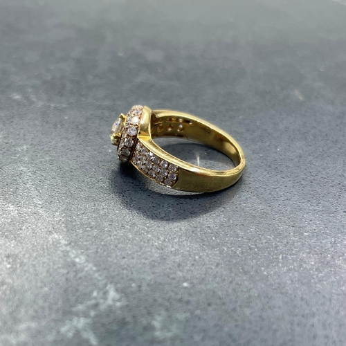 54 - Impressive '750' and diamond halo ring, central stone .5ct, framed by smaller diamonds with further ... 
