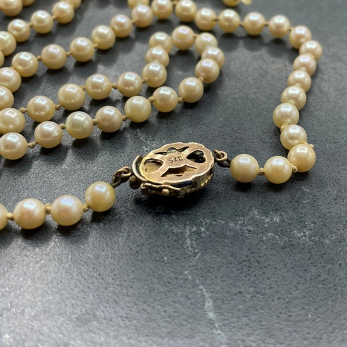 62 - Vintage cultured pearl necklace with 9ct and sapphire clasp, 0.8ct stone, necklace af