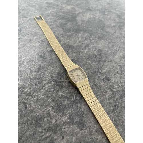 6 - Omega ladies 9ct integral bracelet watch, 16mm case, cream dial with gilt hands and markers, manual ... 