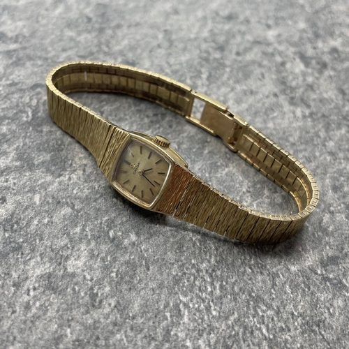 6 - Omega ladies 9ct integral bracelet watch, 16mm case, cream dial with gilt hands and markers, manual ... 