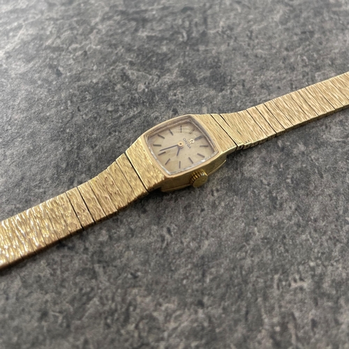 6 - Omega ladies 9ct integral bracelet watch, 16mm case, cream dial with gilt hands and markers, manual ... 