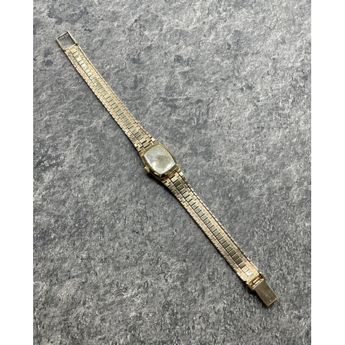 6 - Omega ladies 9ct integral bracelet watch, 16mm case, cream dial with gilt hands and markers, manual ... 
