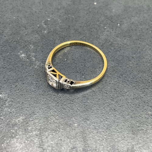 66 - 18ct and platinum diamond ring, .30ct central stone flanked by two smaller diamonds, size K, 1.8g