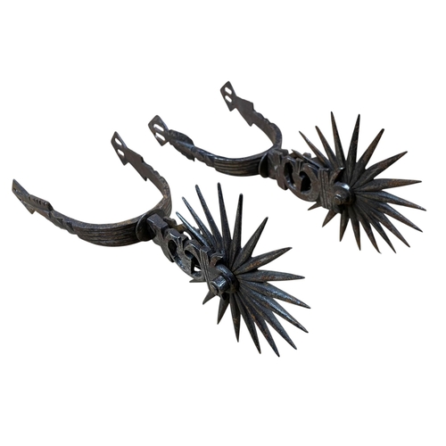 2084 - Pair of South American gaucho steel spurs with spiked heel rowels