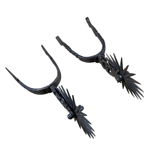 2084 - Pair of South American gaucho steel spurs with spiked heel rowels