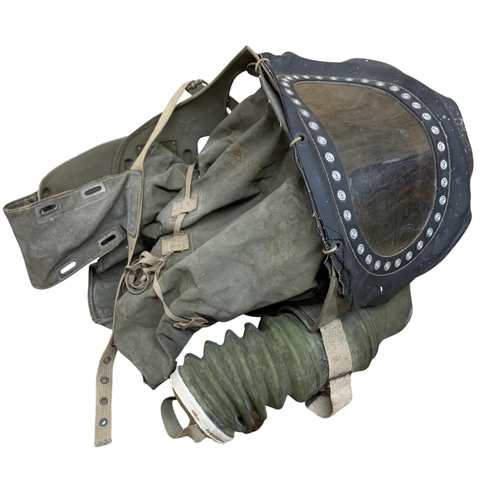 2053 - A WWII Home Front baby's gas mask by ROMAC, dated 1939; together with a WWII civilian gas mask (a/f)... 