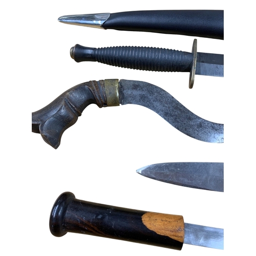 2086 - Mixed quantity of daggers and knives to include Indian curved dagger, dragon claw and ball handled s... 
