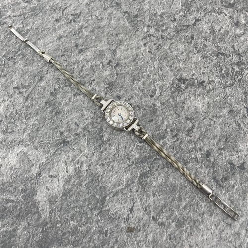 27 - Vintage platinum and diamond ladies cocktail watch, 17mm case with diamond set bezel with fourteen .... 