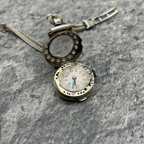 27 - Vintage platinum and diamond ladies cocktail watch, 17mm case with diamond set bezel with fourteen .... 