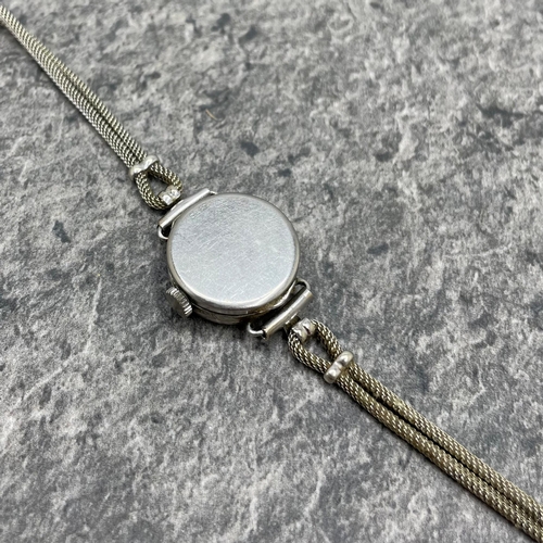 27 - Vintage platinum and diamond ladies cocktail watch, 17mm case with diamond set bezel with fourteen .... 