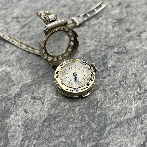 27 - Vintage platinum and diamond ladies cocktail watch, 17mm case with diamond set bezel with fourteen .... 