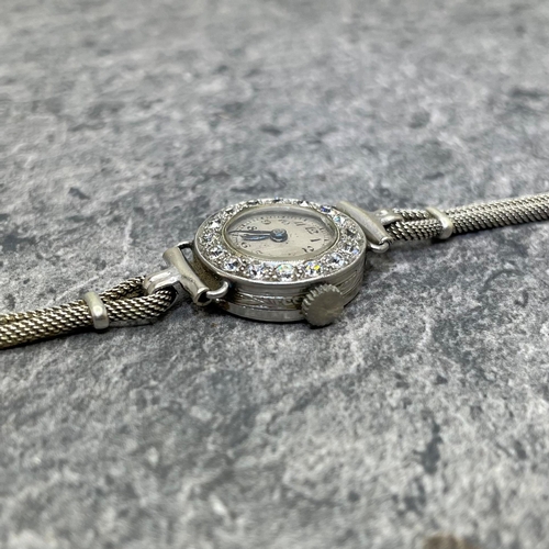 27 - Vintage platinum and diamond ladies cocktail watch, 17mm case with diamond set bezel with fourteen .... 