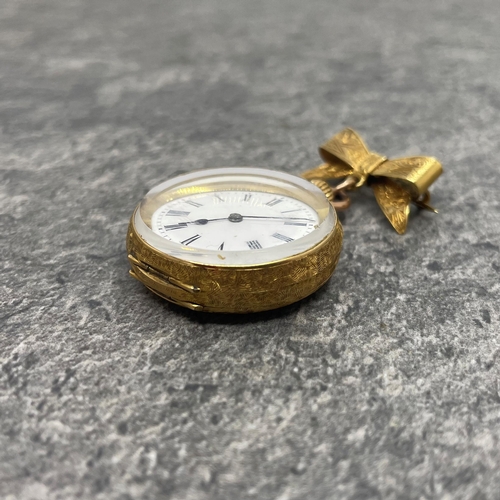 25 - 18k Swiss fob watch, 33mm case, enamel dial, with 18k bow brooch with 9ct bail, 29.3g gross