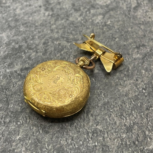 25 - 18k Swiss fob watch, 33mm case, enamel dial, with 18k bow brooch with 9ct bail, 29.3g gross