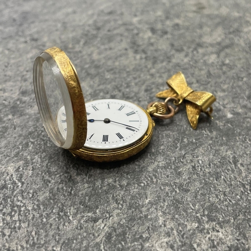 25 - 18k Swiss fob watch, 33mm case, enamel dial, with 18k bow brooch with 9ct bail, 29.3g gross