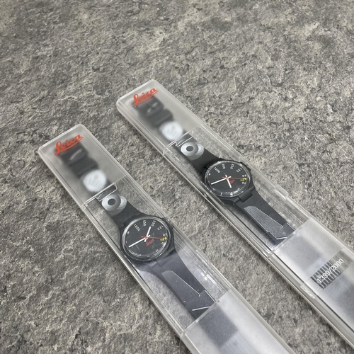 13 - Photography interest - Two Leica Swatch limited edition watches, limited edition of 2000, cased. (2)