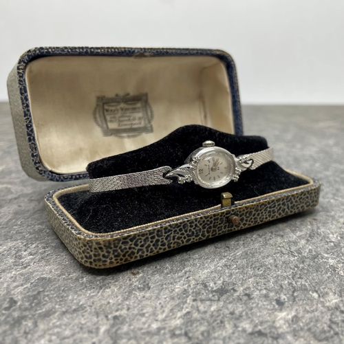 4 - Bulova 14k white gold ladies cocktail watch, 16mm case with fancy diamond set bezel, silvered dial w... 