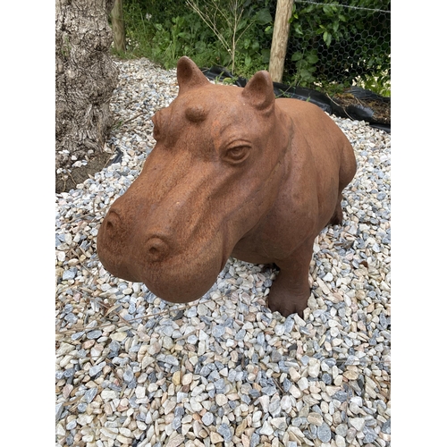 3 - Weathered cast iron study of a recumbent hippo, 64cm x 80cm