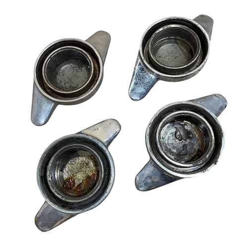35 - Four vintage classic car chromed double ear wheel spinners